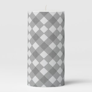 Checkered patches pattern black and white pillar candle