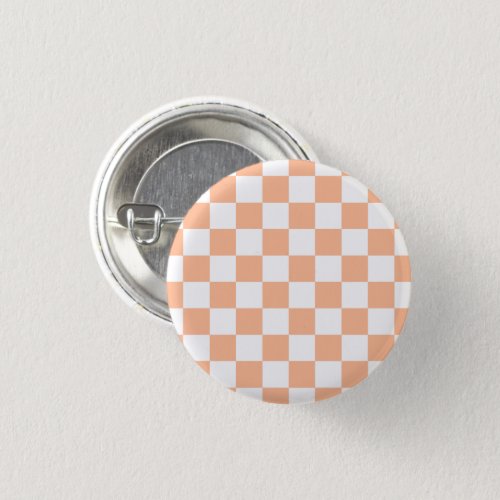 Checkered squares peach and white geometric retro button