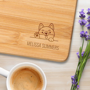 Cheerful Dog Peeking above Custom Name Engraved Cutting Board