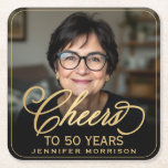 Cheers to 50 Years Birthday Photo Gold Black Square Paper Coaster<br><div class="desc">Complete your milestone celebration with these Cheers to 50 Years square paper coasters. Featuring your custom photo on a bold black background with elegant gold script, these coasters protect your tables while adding sophistication to your party décor. Perfect for cocktails, wine, or champagne toasts, they pair beautifully with matching invitations,...</div>