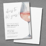 Cheers To 60 Years 60th Birthday Party Invitation<br><div class="desc">"Cheers to 60 years!" is proudly displayed at the top of this classic and elegant invitation, featuring a large watercolor pink and gray wine glass on the right side, giving it a modern twist. You can customize the year to celebrate any milestone. The design uses script typography for "Cheers to...</div>