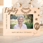 Cheers To 80 Years Happy Birthday Engraved Frames<br><div class="desc">Honor the remarkable milestone of an 80th birthday with this "Cheers to 80 Years" etched wooden frame. Beautifully engraved with stars, a festive birthday banner, and a custom message, this frame is a heartfelt way to celebrate eight decades of wonderful memories. Personalize it with a name to create a unique...</div>