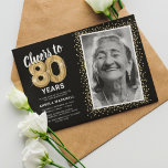 Cheers to Eighty Years 80th Birthday Photo Invitation<br><div class="desc">Elegant eightieth birthday party invitation featuring a stylish black background that can be changed to any color,  a photo of the birthday girl / boy,  gold sparkly glitter,  eighty gold hellium balloons,  and a modern 80th birthday celebration text template that is easy to personalize.</div>