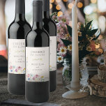 Cheers to Love Wildflower Wedding Floral Wine Label<br><div class="desc">Cheers to Love Wildflower Wedding Wine Labels decorated with watercolor wild flowers, which you can personalize with the wedding date and the name of the bride and groom. Perfect for your dinner rehearsal, wedding reception or gifts and favors. This rustic country botanical design has a pretty border of wildflowers including...</div>