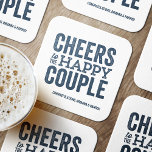 Cheers to the happy couple blue wedding rehearsal square paper coaster<br><div class="desc">Before your wedding day, have some fun with a "Brews Before I Do's" celebration. Whether it's a rehearsal dinner, bachelor party or engagement party, this fun bold coaster design is perfect for a brewery or beer-themed celebration. This "cheers to the happy couple" original design can also be personalized with the...</div>
