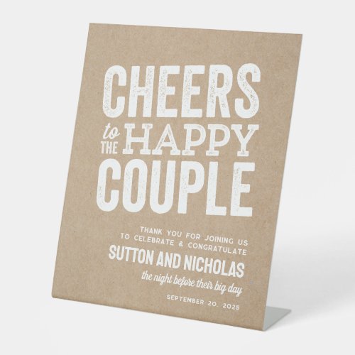 Cheers to the happy couple kraft rehearsal dinner pedestal sign