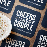 Cheers to the happy couple navy rehearsal dinner square paper coaster<br><div class="desc">Before your wedding day, have some fun with a "Brews Before I Do's" celebration. Whether it's a rehearsal dinner, bachelor party or engagement party, this fun bold coaster design is perfect for a brewery or beer-themed celebration. This "cheers to the happy couple" original design can also be personalized with the...</div>