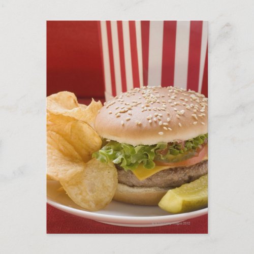 Cheeseburger with potato crisps and gherkin postcard