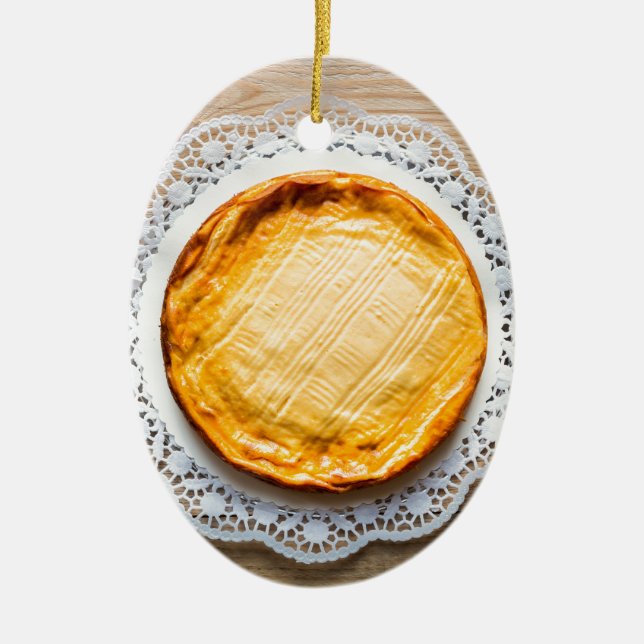 Cheesecake on rustic wood cake top. ceramic ornament (Front)