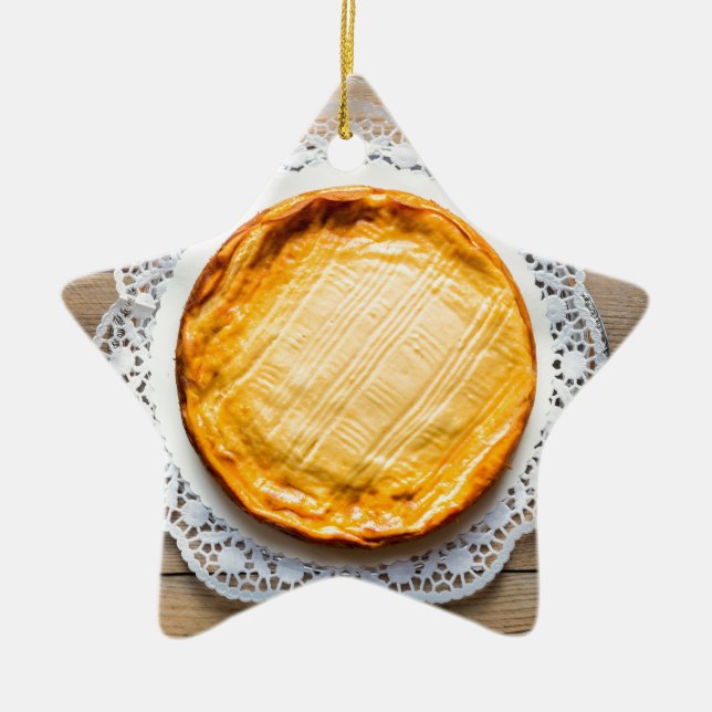 Cheesecake on rustic wood cake top. ceramic ornament (Front)