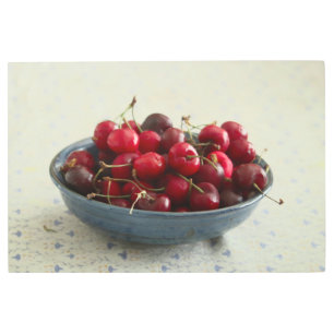 Cherries in a blue bowl metal print