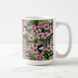 Cherry blossom and chickadees on green coffee mug