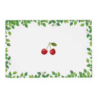 Cherry Fruits and Green Leaves on White Placemat