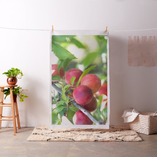 Cherry plum on branch fabric