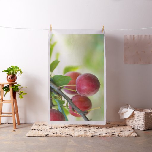 Cherry plum on branch fabric