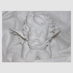cherub in white tissue paper