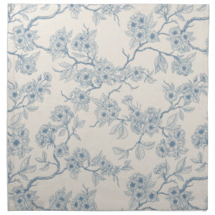 Chery blossom branches in blue and off white cloth napkin