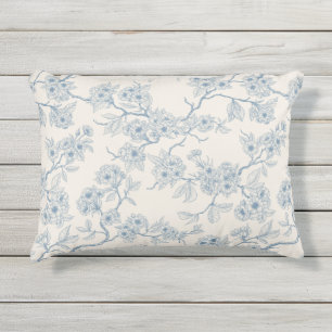 Chery blossom branches in blue and off white outdoor pillow