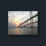 Chesapeake Bay Bridge Sunset canvas Print<br><div class="desc">This photo canvas is a picture of a sunset at the Bay Bridge crossing the Chesapeake Bay. As the sun sets in this beautiful original photograph,  the water reflects the orange,  pink  and yellow sunset.</div>