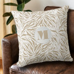Chic Beige Animal Print Monogram Throw Pillow<br><div class="desc">A stylish throw pillow features a pattern of tan and white wild animal print and your chic initial monogram. Create for yourself or give as a gift.</div>
