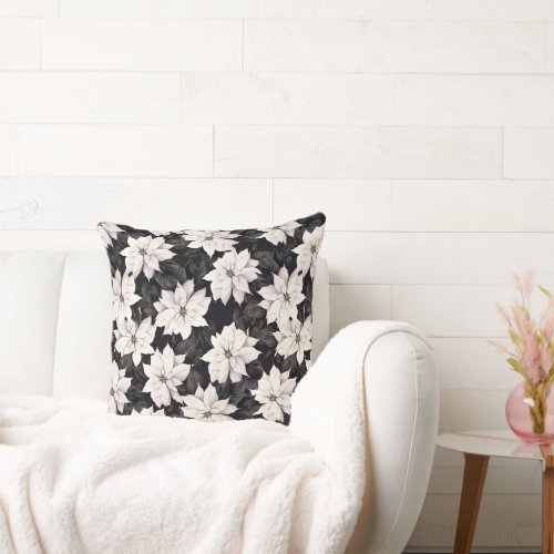 Chic black and white poinsettia throw pillow