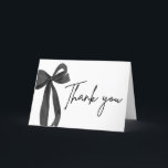 Chic Black Bow Coquette Graduation Thank You Card<br><div class="desc">Say thank you in style with our Chic Black Bow Coquette Graduation Thank You Card 🎓🖤 Featuring an elegant black bow and playful coquette aesthetic, it's the perfect blend of classy and cute! Personalize with your name and message for a heartfelt touch your guests will adore. A fabulous way to...</div>