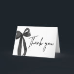 Chic Black Bow Coquette Graduation Thank You Card<br><div class="desc">Say thank you in style with our Chic Black Bow Coquette Graduation Thank You Card 🎓🖤 Featuring an elegant black bow and playful coquette aesthetic, it's the perfect blend of classy and cute! Personalize with your name and message for a heartfelt touch your guests will adore. A fabulous way to...</div>