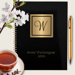Chic Black & Gold Name/Initial Monogram Day Planner<br><div class="desc">Modern minimalist black and gold monogram day planner that is perfect for business or personal appointments.  By using Zazzle's design tools and collection of fonts,  your personal or business information can be easily inserted (i.e.,  name,  date and planner name,  if a planner name change is desired).</div>