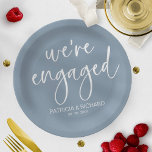 Chic Calligraphy We're Engaged Engagement Party Paper Plates<br><div class="desc">A stylish calligraphy engagement party paper plate. Easy to personalize with your details. CUSTOMIZATION: If you need design customization,  please contact me through chat; if you need information about your order,  shipping options,  etc.,  please get in touch with Zazzle support directly.</div>