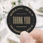 Chic Deco Typography Thank You Black & Gold Classic Round Sticker<br><div class="desc">Add an elegant touch to wedding thank you cards and reception party favors with round customized stickers / envelope seals. All wording on this template is simple to personalize for a bridal shower, anniversary, vow renewal or other occasion. The text in a circle can be changed to a name and...</div>