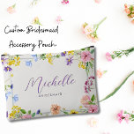 Chic Elegant Pink Lilac Wildflowers Bridesmaid Accessory Pouch<br><div class="desc">Introducing our Chic Elegant Pink Lilac Wildflowers Bridesmaid Accessory Pouch, a delightful and stylish gift for your cherished bridesmaids. Embodying the perfect blend of rustic charm and modern elegance, this accessory pouch adds a touch of natural beauty to any ensemble. Crafted with a minimalist design, this pouch features watercolor wildflowers...</div>