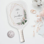 Chic Gold Floral Frame Wedding Couple Name Date Pickleball Paddle<br><div class="desc">The perfect paddle for the pickleball loving couple. Great for some wedding pickleball - reception, outdoor wedding, bachelorette/bachelor parties and more. Design features the couples name in a gorgeous calligraphy script font highlighted by a beautiful geometric gold floral frame. This paddle makes a very special gift for the wedding couple....</div>