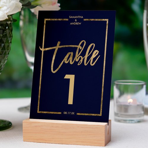 Chic gold frame script navy blue table number