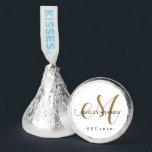 Chic Gold M Monogram Script Name Wedding Date Hershey®'s Kisses®<br><div class="desc">Chic, modern gold monogrammed wedding Hershey®'s Kisses® with your names and year established in black elegant hand lettered script calligraphy and classic typography with a gold M monogram on a white background. Simply add your names, monogram and year established beneath. Stylish design and perfect wedding table decor. Contact me for...</div>