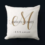 Chic Gold M Monogram Script Name Wedding Date Throw Pillow<br><div class="desc">Chic, modern gold monogrammed wedding outdoor pillow with your names and year established in black elegant hand lettered script calligraphy and classic typography with a gold M monogram on a white background. Simply add your names, monogram and year established beneath. Stylish design and perfect wedding table decor. Contact me for...</div>
