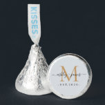 Chic Gold Monogram Names Wedding Date Pastel Blue Hershey®'s Kisses®<br><div class="desc">Chic, elegant Hershey kisses candy wedding favors with your names and year established in black elegant handwritten script calligraphy on a pastel blue background with a gold monogram. Simply add your names, monogram and year established beneath. Stylish design and perfect luxury candy favor gift for the newlywed couple. If you...</div>
