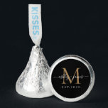 Chic Gold Monogram Script Names Wedding Date Black Hershey®'s Kisses®<br><div class="desc">Chic, elegant Hershey kisses candy wedding favors with your names and year established in white elegant handwritten script calligraphy on a black background with a gold monogram. Simply add your names, monogram and year established beneath. Stylish design and perfect luxury candy favor gift for the newlywed couple. If you need...</div>