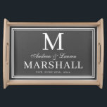 Chic Grey Newlywed Couple Monogram Name Wedding Serving Tray<br><div class="desc">Modern minimalist personalized dark grey and white serving tray with the couples first names in a calligraphy script,  last name monogram,  full last name,  and wedding date available in customizable templates.  A stylish,  elegant newlywed gift for the bride and groom with a custom personal touch.</div>