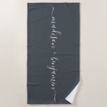Chic Newlywed Monogram Names Off-Black Beach Towel<br><div class="desc">Chic black and white monogrammed beach towel with the names of the newly weds in handwritten white elegant script calligraphy on an off-black background. Simply add your names. Perfect gift for the newlywed couple or engaged couple. Exclusively designed for you by Happy Dolphin Studio. If you need any help or...</div>