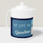 Chic Personalized Photo Text Grandma Gift Blue Teapot<br><div class="desc">Enjoy your morning tea in style with our Chic Personalized Photo Text Tea Pot. This teapot is a perfect way to add a personal touch to your tea time routine, featuring a custom front side with your photo and text. The vintage floral design provides a beautiful backdrop for your customized...</div>