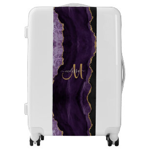 purple and gold luggage