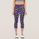 Chic Purple Silver Heart Pattern Personalized Name Capri Leggings<br><div class="desc">This modern design features a purple background with a silver heart pattern personalized with your name by editing the text in the text box provided #leggings #clothing #apparel #gifts #fitness #sports #fitnessapparel #fitnessclothing #fashion #fashionable #style #stylish #trendy #trending #heart #personalizedgifts #personalized</div>