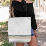 Chic Retro Stripes Monogram Tote Bag<br><div class="desc">A minimalist monogram design with large typography initials in a classic font with your name below and chic retro rainbow colored stripes. Every woman needs a good carry all to tote around all of her essentials. Whether it's a bridesmaid gift, a birthday gift or even just a nice little gift...</div>