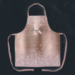 Chic Rose Gold Diamond Glitter Monogrammed Apron<br><div class="desc">Elegant, Sparkle Luxury, Glam, Girly faux rose gold glitter diamond confetti custom personalized monogramme apron. Features a fauxpink rose gold brushed metal background, with blush pink rose gold glitter and white diamonds confetti. Beautiful name template in hand lettering calligraphy font script with swashes. Add your name and monogram initial. Please...</div>