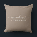 Chic Script Mr Mrs Taupe Newlywed Monogram Throw Pillow<br><div class="desc">Chic, modern monogrammed pillow with the text Mr and Mrs in white elegant script on a taupe background. Simply add your married name. Perfect gift for the newlywed couple. Exclusively designed for you by Happy Dolphin Studio. If you need any help or matching products please contact us at happydolphinstudio@outlook.com. We're...</div>