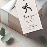 Chic She's Tying the Knot Black Bow Bridal Shower Gift Tags<br><div class="desc">Enhance your bridal shower favors with our chic black pink bow 'She's Tying the Knot Gift tags. These delightful tags add a touch of elegance to any favor, complementing the theme perfectly. Make your guests feel special with these lovely gift tags, designed to coordinate effortlessly with your bridal shower decor....</div>
