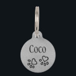 Chic Silvery Gray Name w/ Heart Paw Print Custom Pet ID Tag<br><div class="desc">Glam silver gray personalized pet ID tag featuring a simulated silvery metallic background and cute heart paw print illustration. Front has a space for your beloved pet's name while the back carries several lines of custom text. Customize it with your phone number, contact information or other custom message. Nice and...</div>