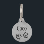 Chic Silvery Gray Name w/ Heart Paw Print Custom Pet ID Tag<br><div class="desc">Glam silver gray personalized pet ID tag featuring a simulated silvery metallic background and cute heart paw print illustration. Front has a space for your beloved pet's name while the back carries several lines of custom text. Customize it with your phone number, contact information or other custom message. Nice and...</div>