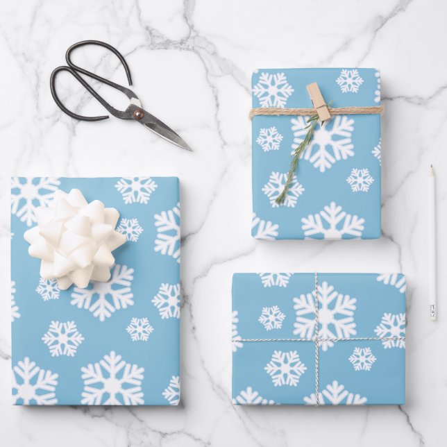 Chic White Snowflakes Nordic Pattern on Ice Blue Wrapping Paper Sheets (Front)