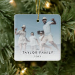Chic Yearly Family Photo Keepsake Ceramic Ornament<br><div class="desc">This chic yearly family photo keepsake ceramic ornament is the perfect modern Christmas tree decoration. The simple design features classic minimalist black and white typography with a rustic boho feel. Personalize your double-sided keepsake ornament with a photo,  your family name and the year.</div>